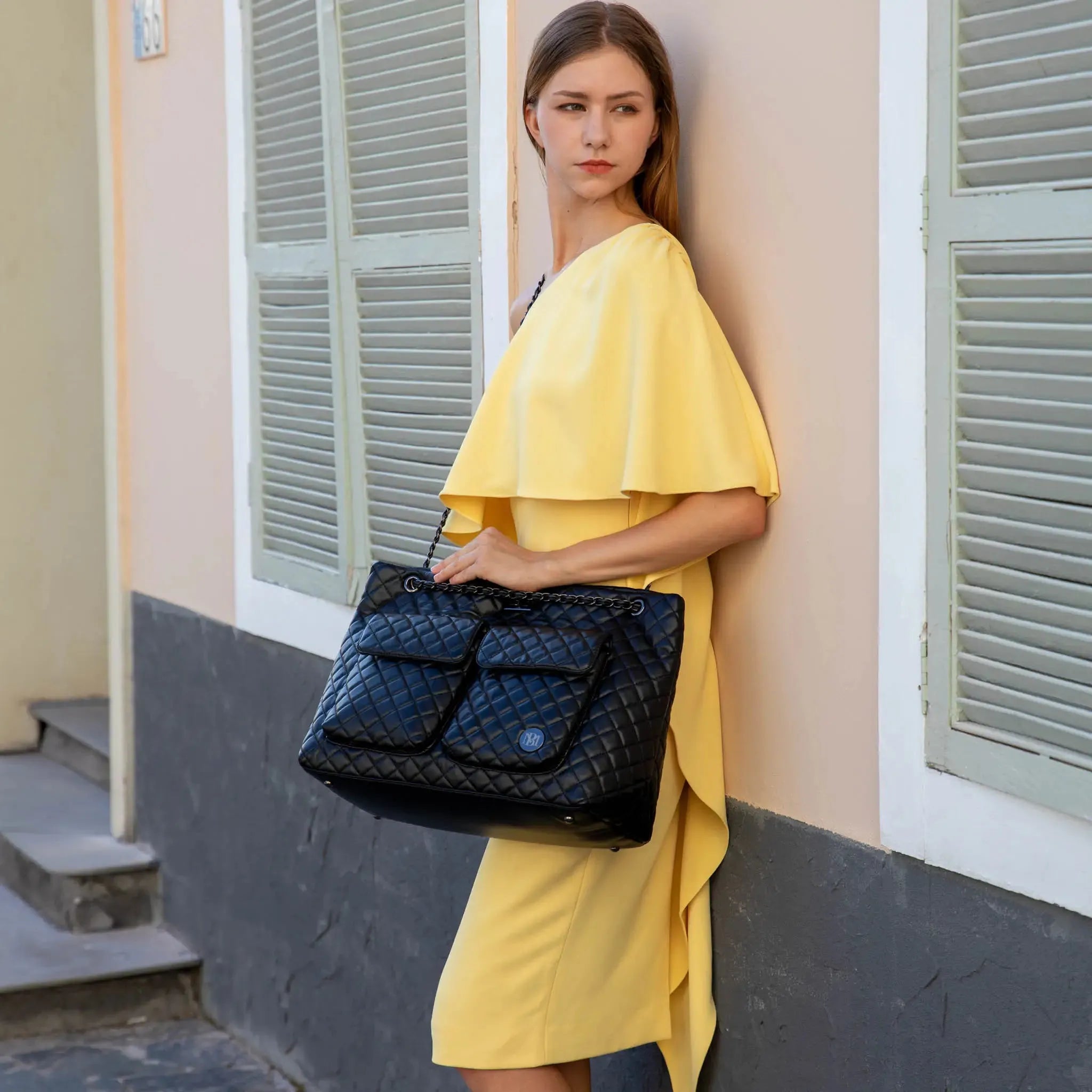 Diana Quilted Vegan Leather Weekender Tote Bag — the perfect Bali vacation packing companion at Sun of the Beach Boutique