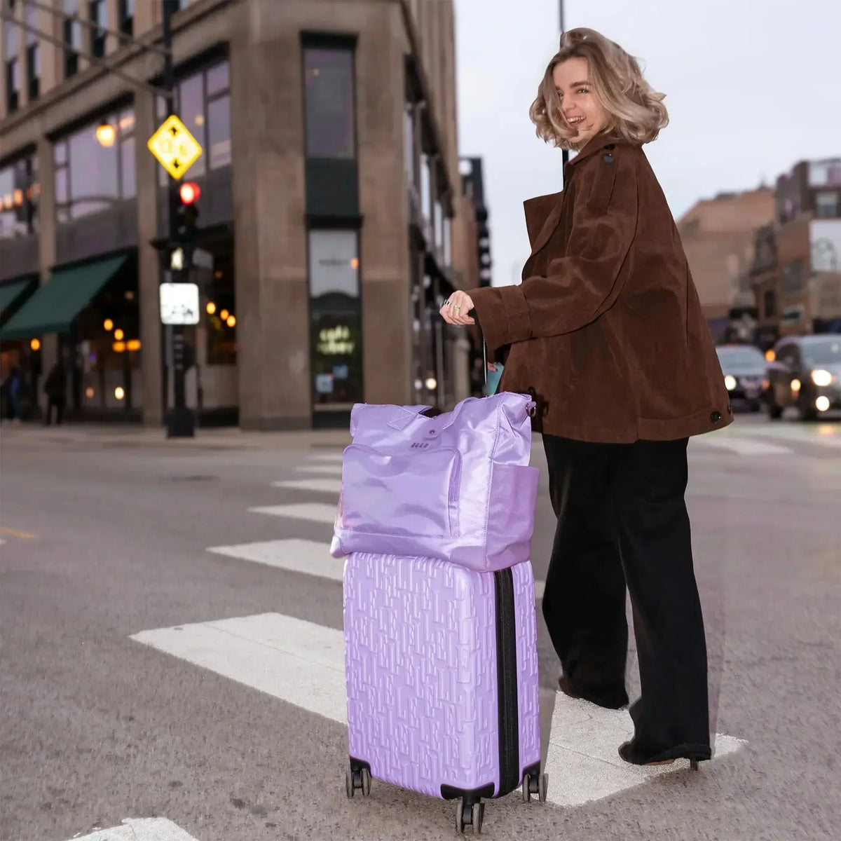 ELLE Voyage 25L Twill and Vegan Leather Weekender Tote Bag Lavender lifestyle shot — best fabrics for comfortable vacation wear at Sun of the Beach Boutique