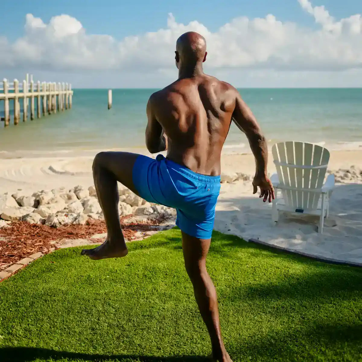 Man excercising at the beach