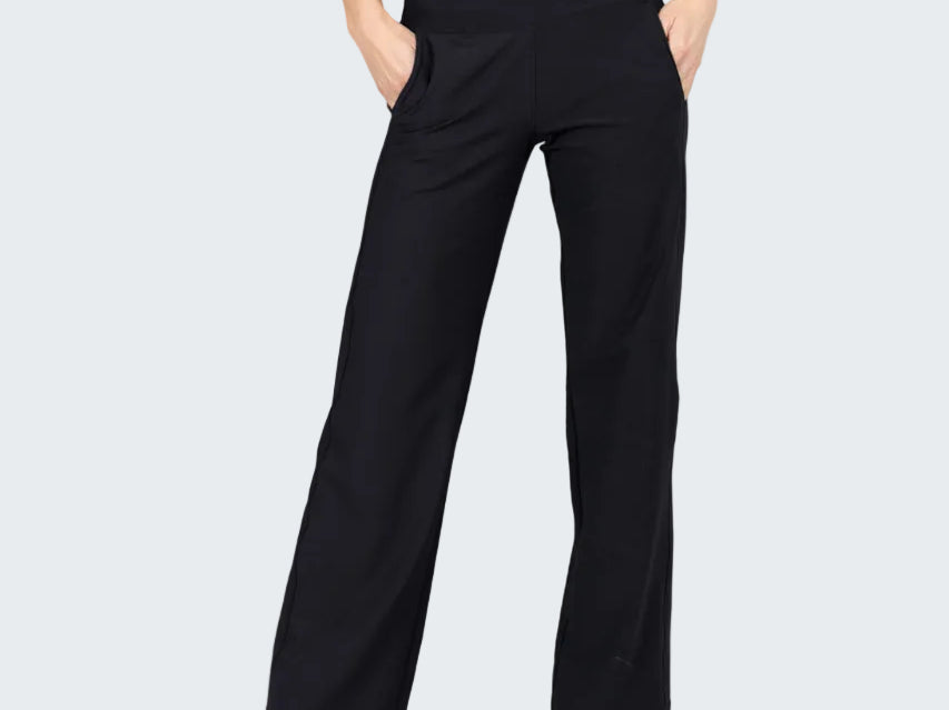 Black wide-leg pants worn by a person on a gray background