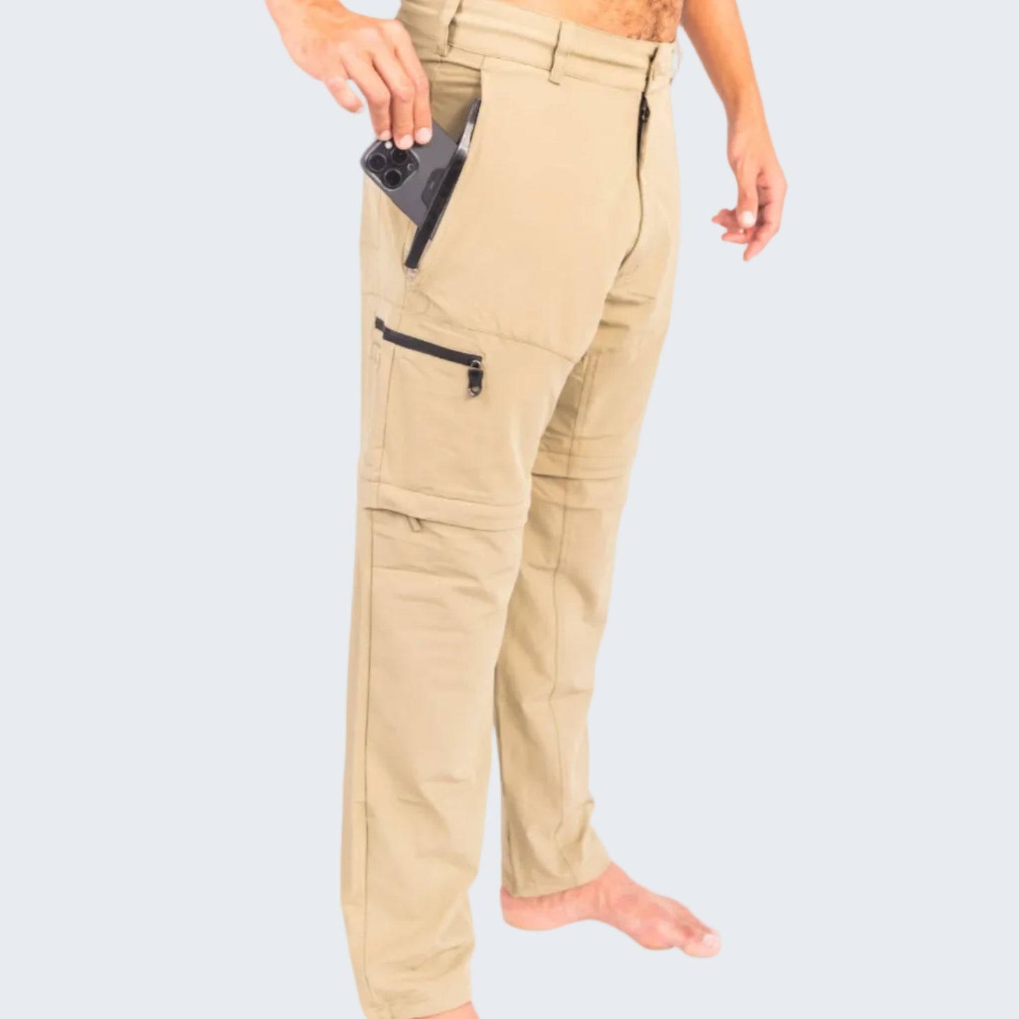 Beige pants with zippers on a white background