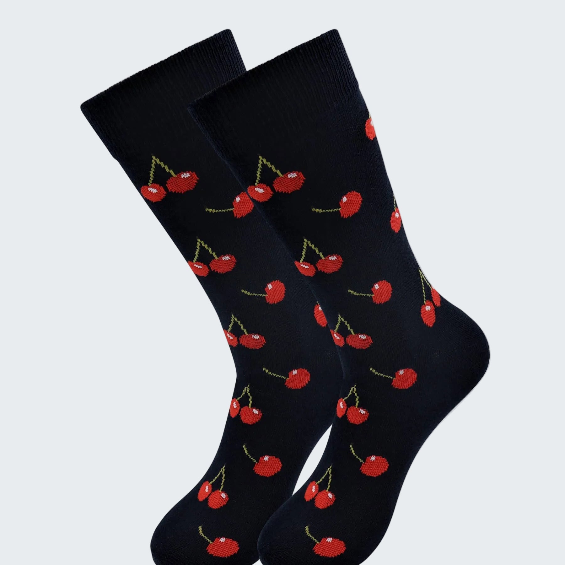 Black socks with red cherry pattern on a white background