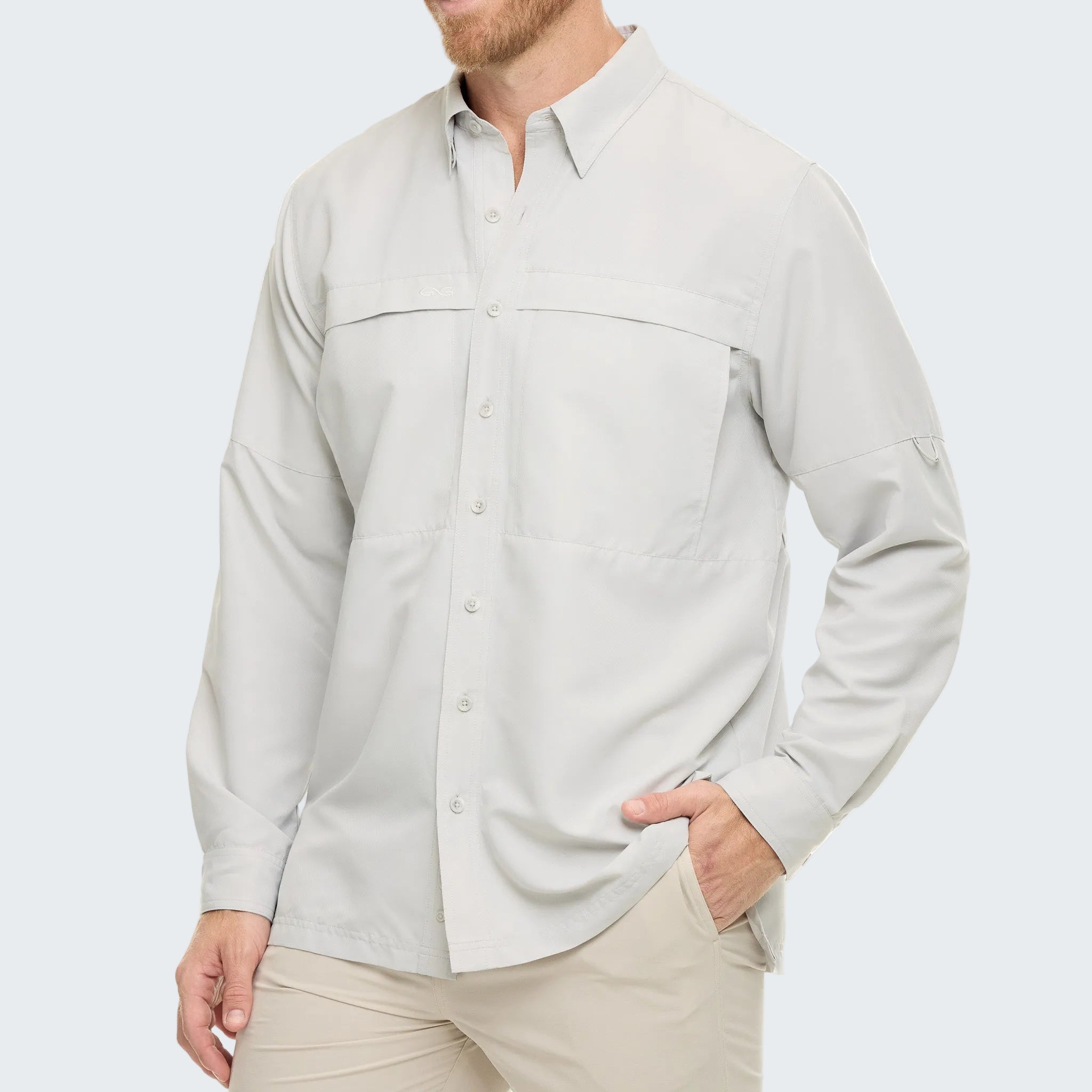 Light gray button-up shirt worn by a person on a white background