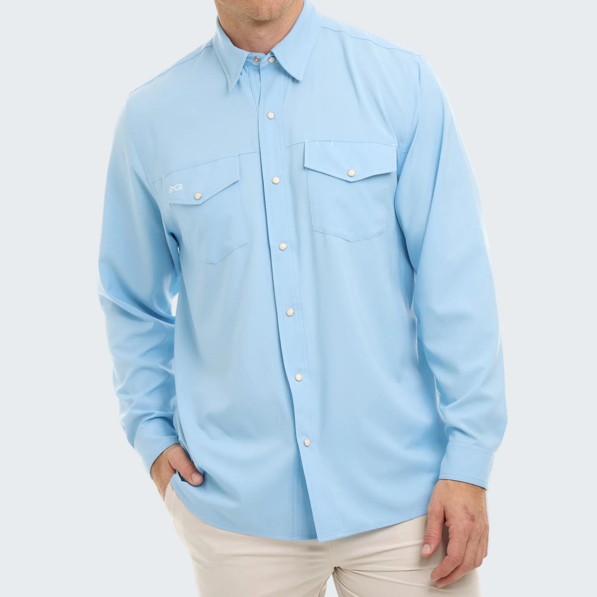 Light blue button-up shirt worn by a person on a white background