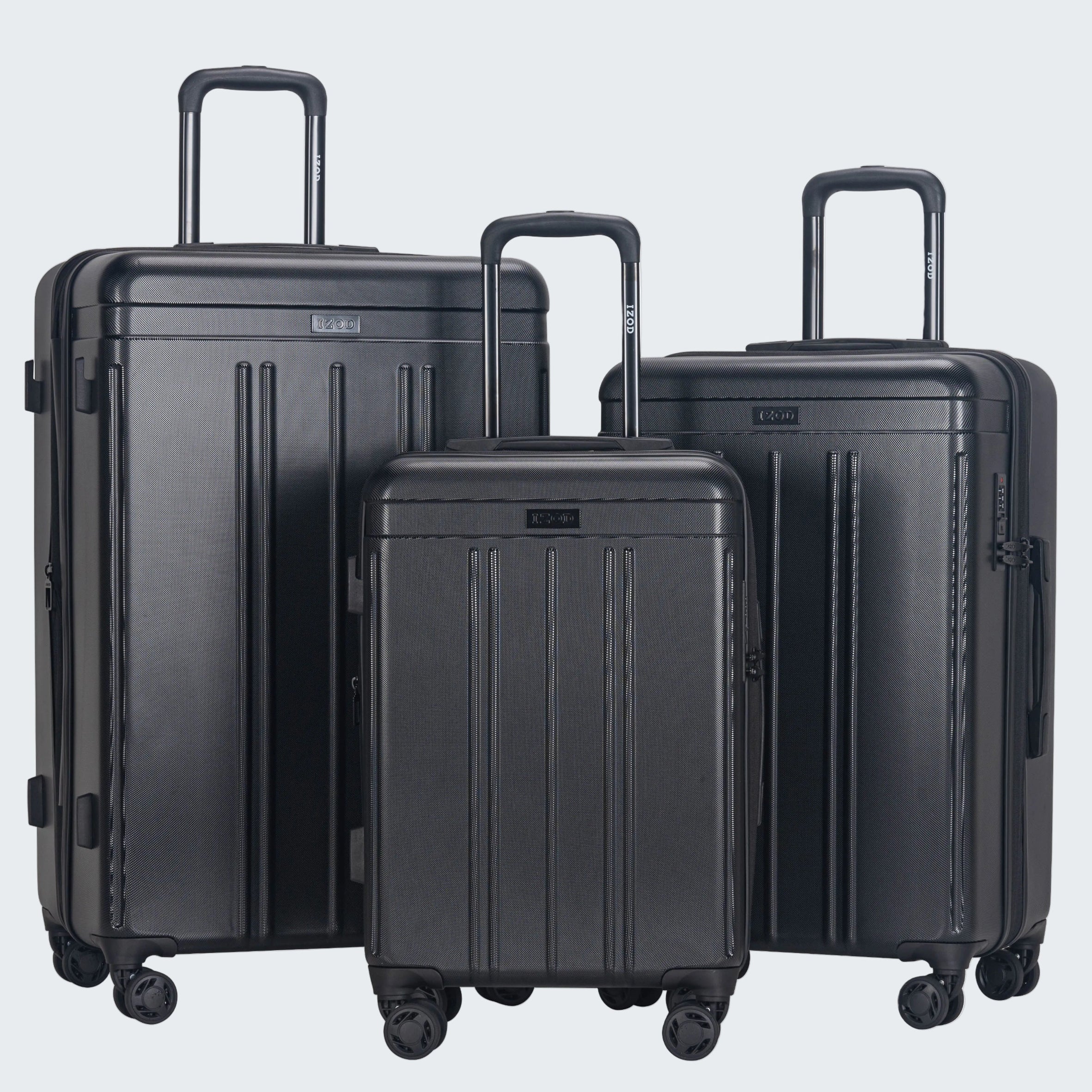 Set of three black suitcases of different sizes on a white background