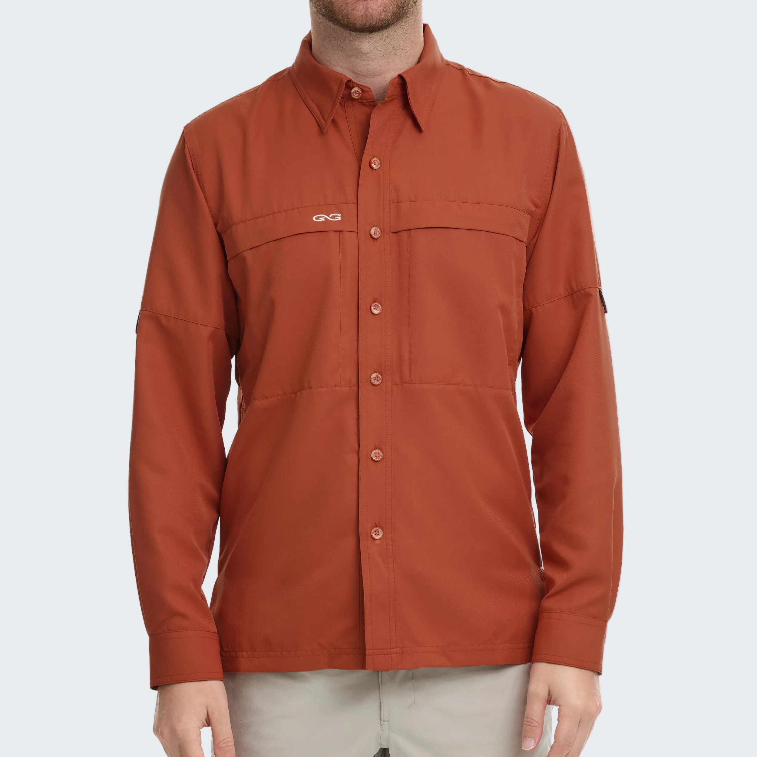 Orange button-up shirt on a white background