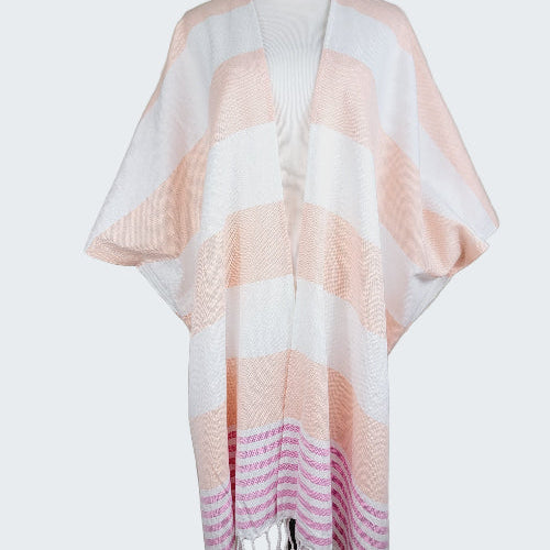 Striped scarf on a mannequin against a plain background