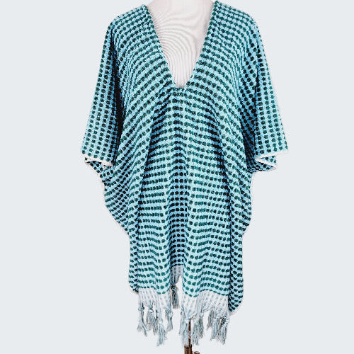 Teal and white checkered kimono-style garment on a mannequin against a beige background