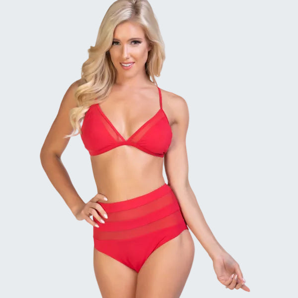 Woman wearing a red bikini set on a white background