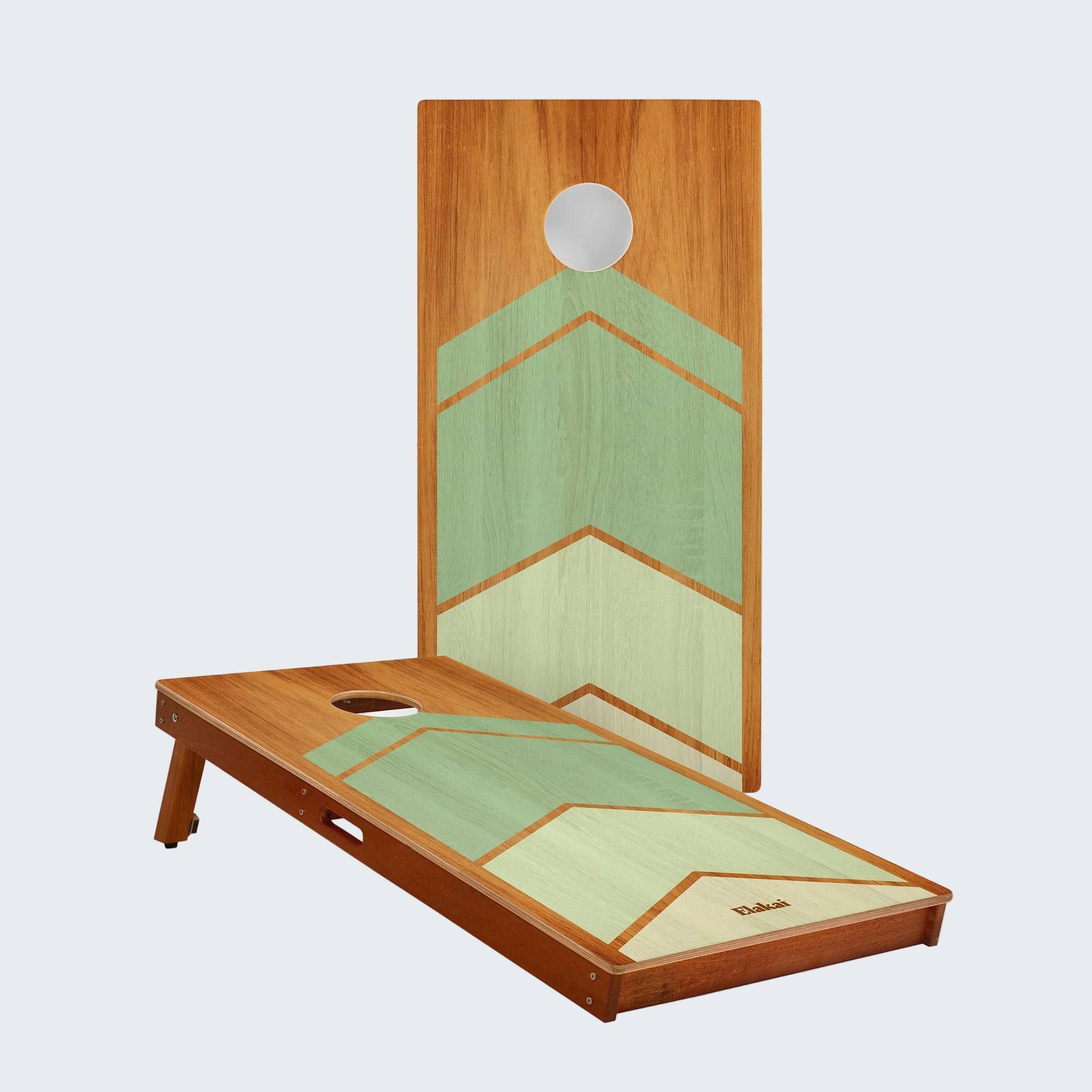 Wooden cornhole board with geometric design on a white background