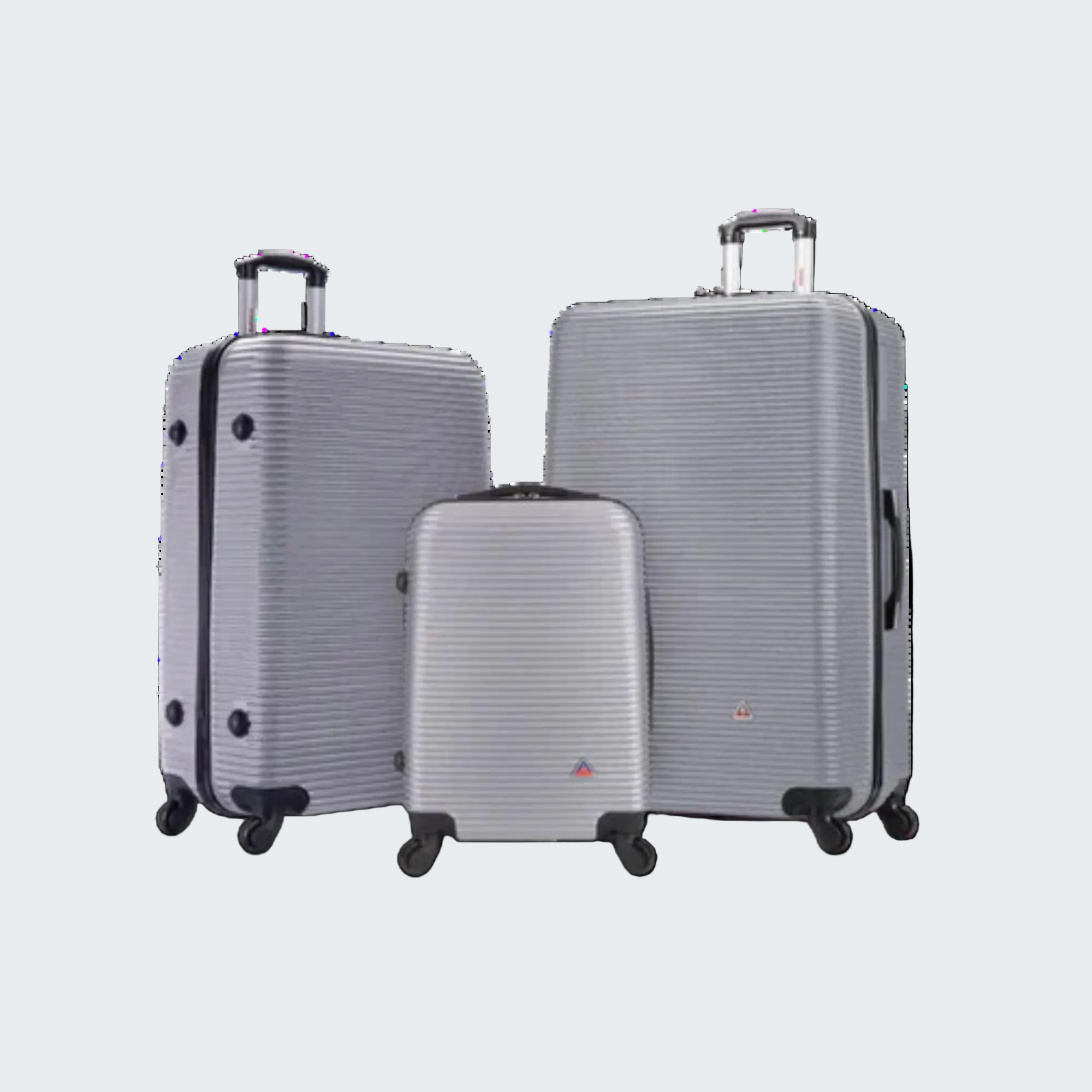Set of three silver suitcases with striped pattern on a white background