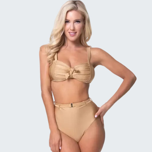 Woman wearing a beige bikini set on a white background