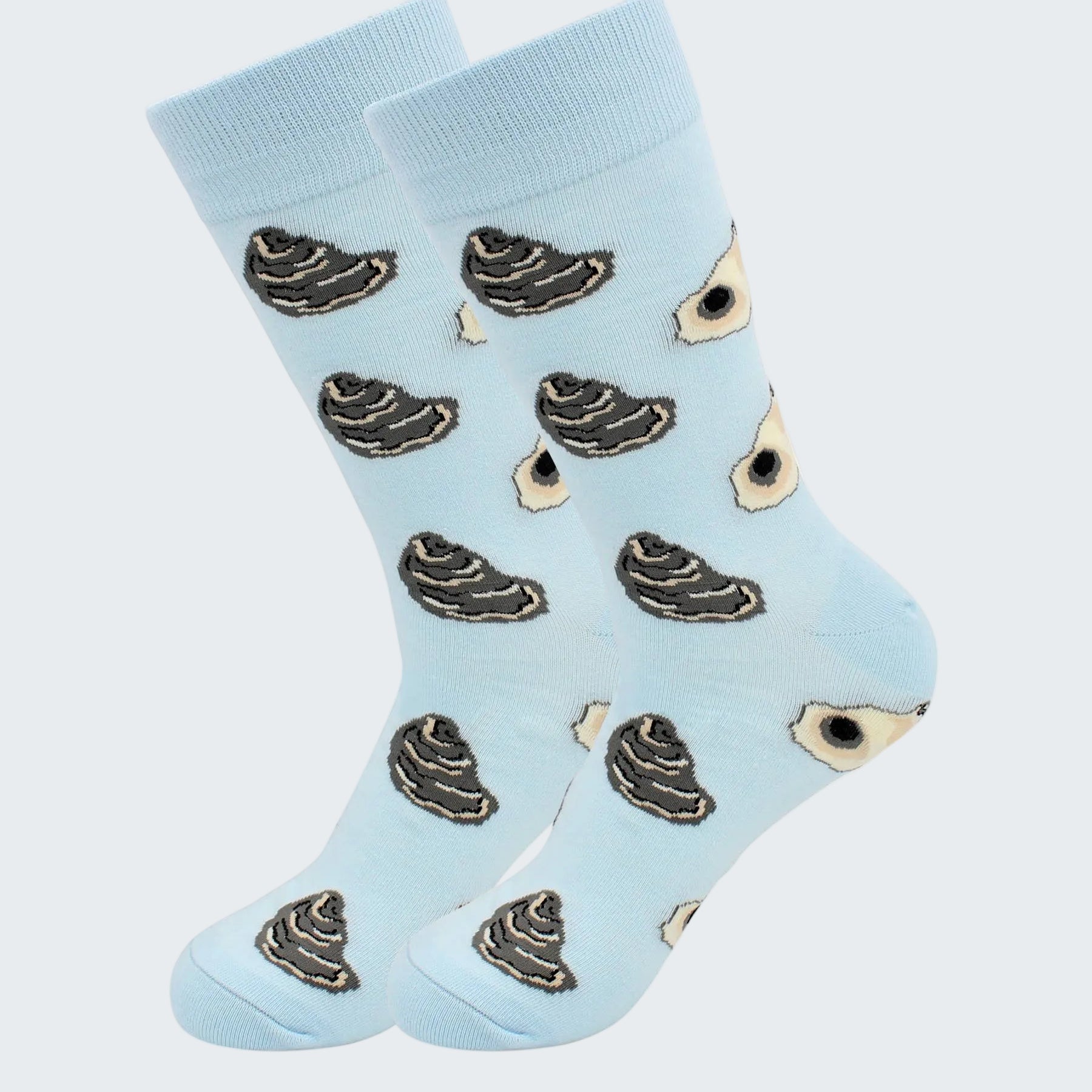 Light blue socks with black and white pattern on a white background