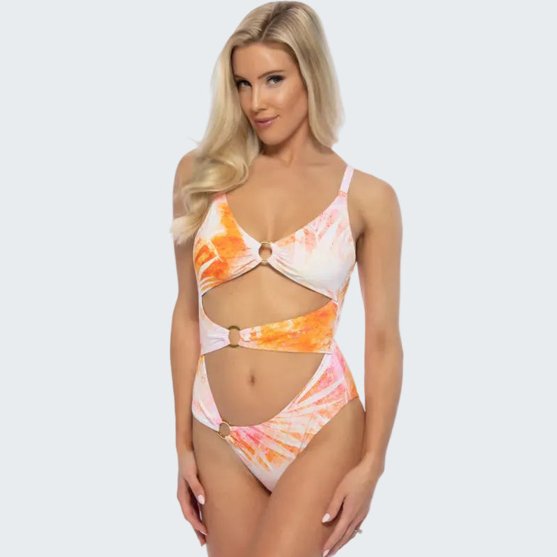Woman wearing a colorful tie-dye swimsuit on a white background