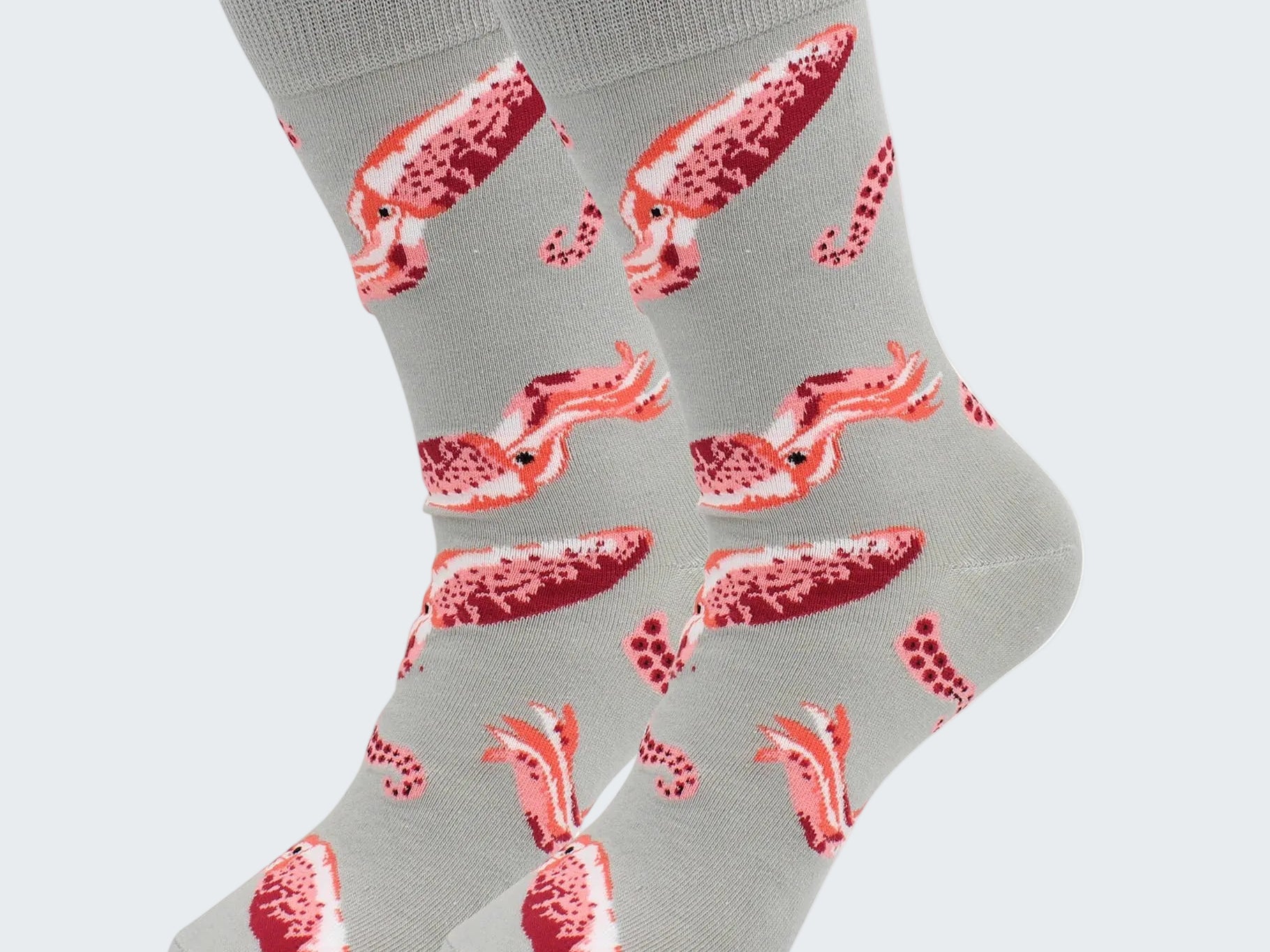 Gray socks with red lobster pattern on a white background