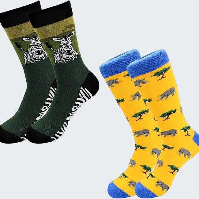 Two pairs of socks with animal patterns on a white background