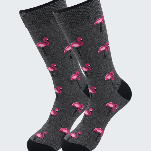 Gray socks with pink flamingo pattern on a white background