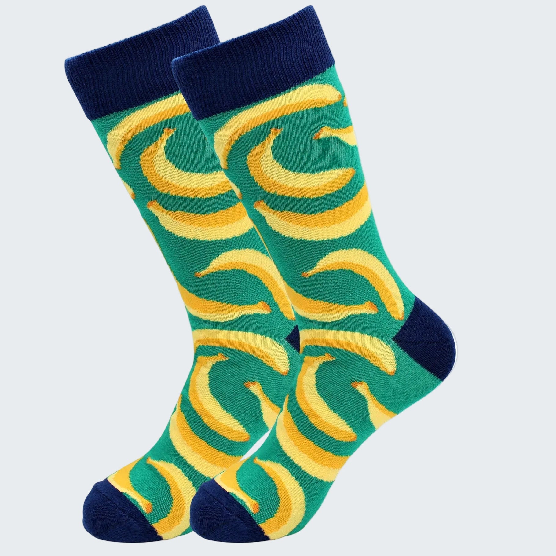 Pair of socks with banana pattern on a white background