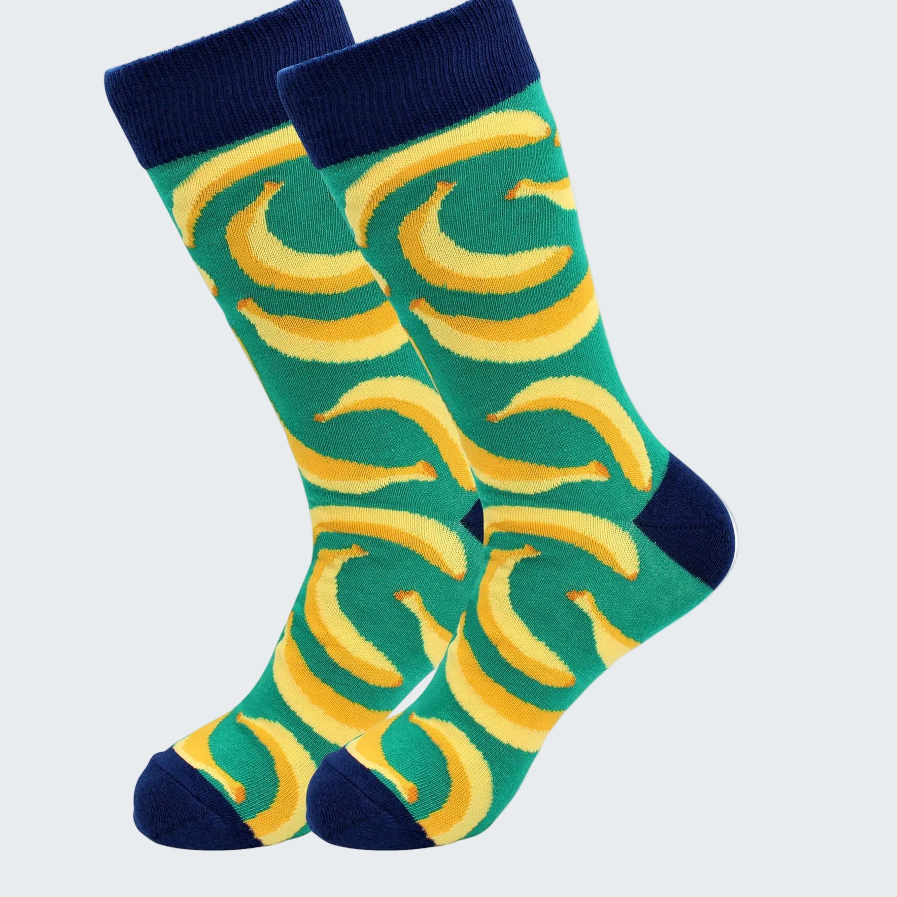 Pair of socks with banana pattern on a white background