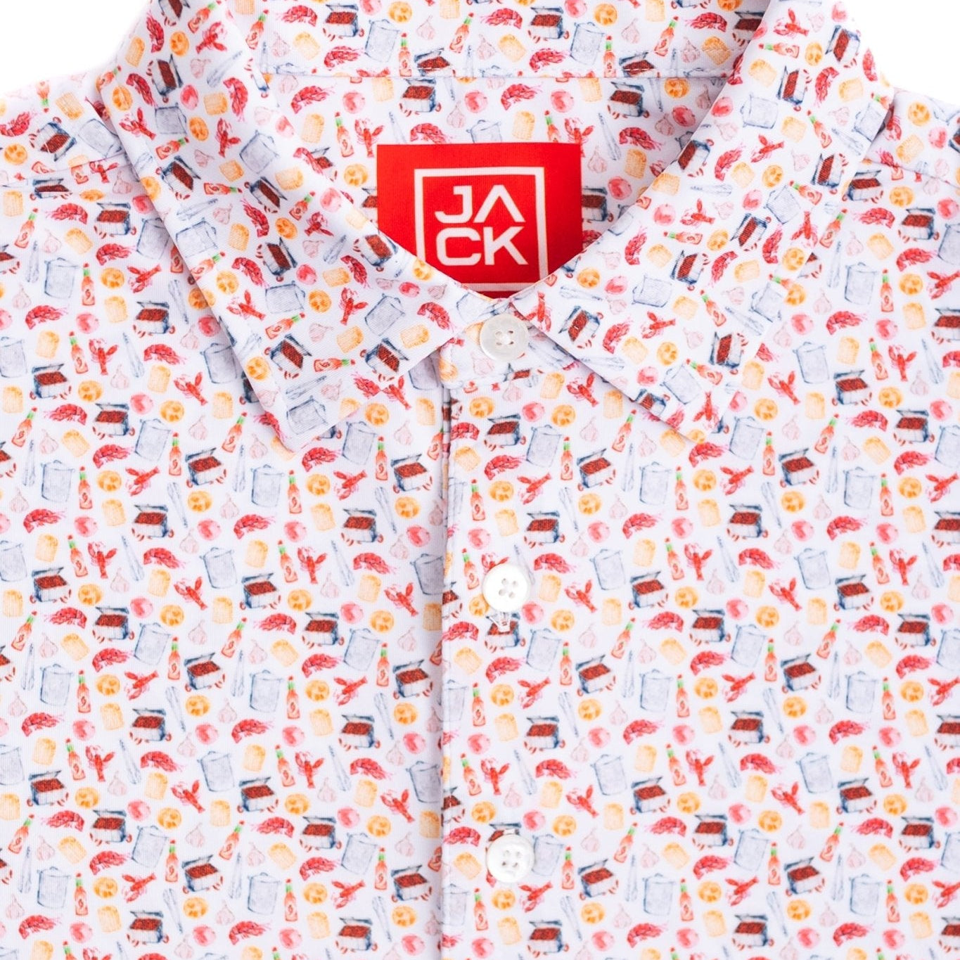 Children's onesie with colorful pattern and visible brand logo on a white background