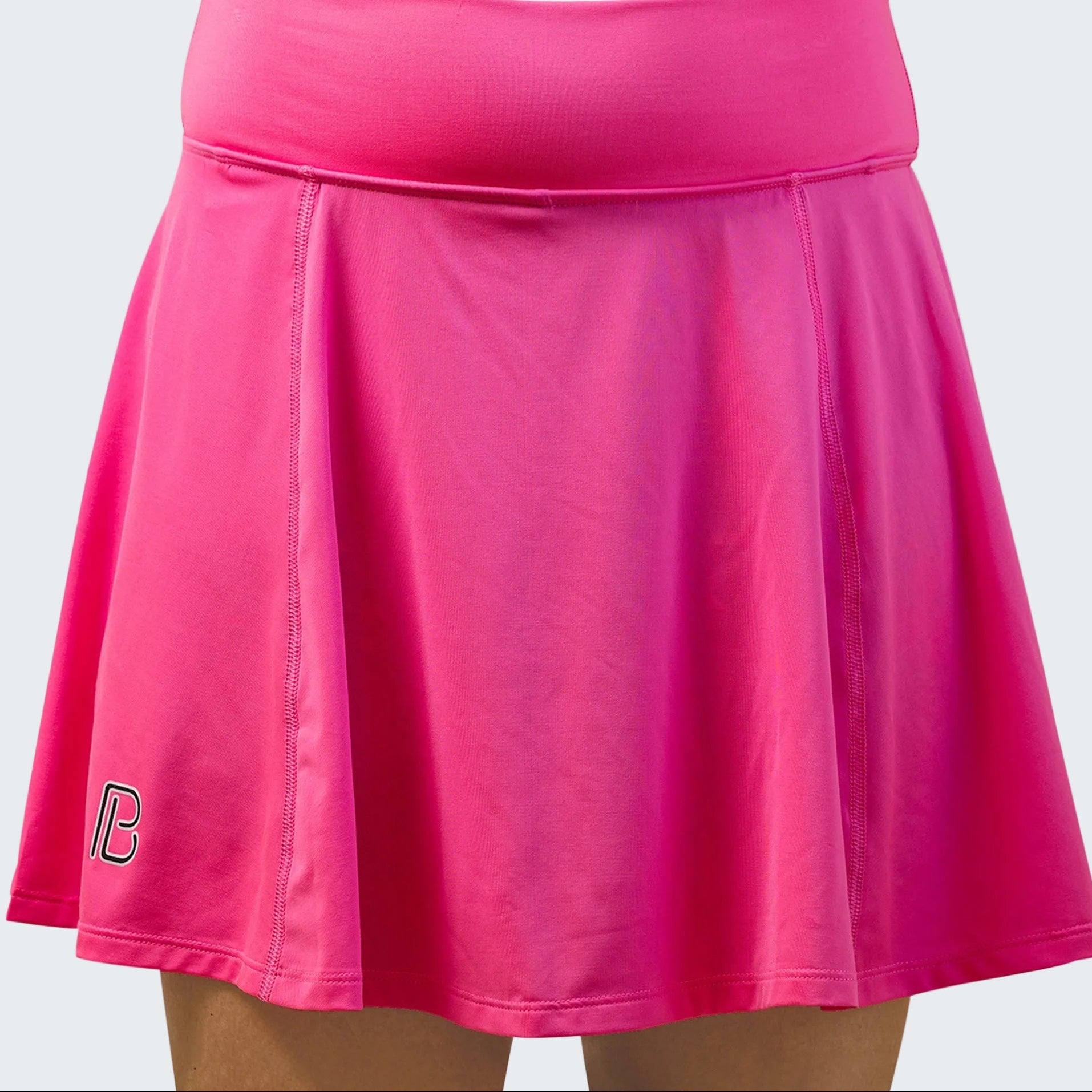 Pink skirt with a brand logo on a white background