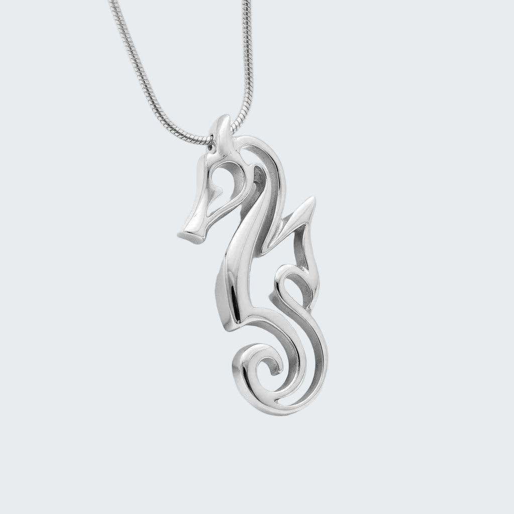 Silver pendant on a white background