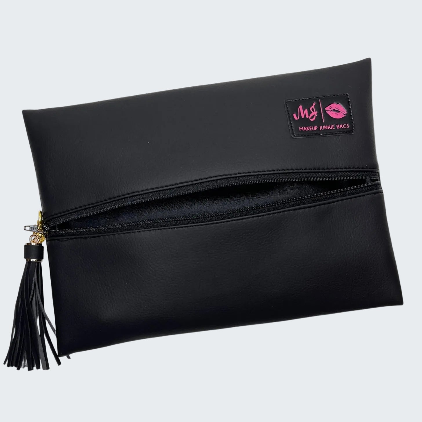Black makeup bag with a brand logo and tassel on a white background