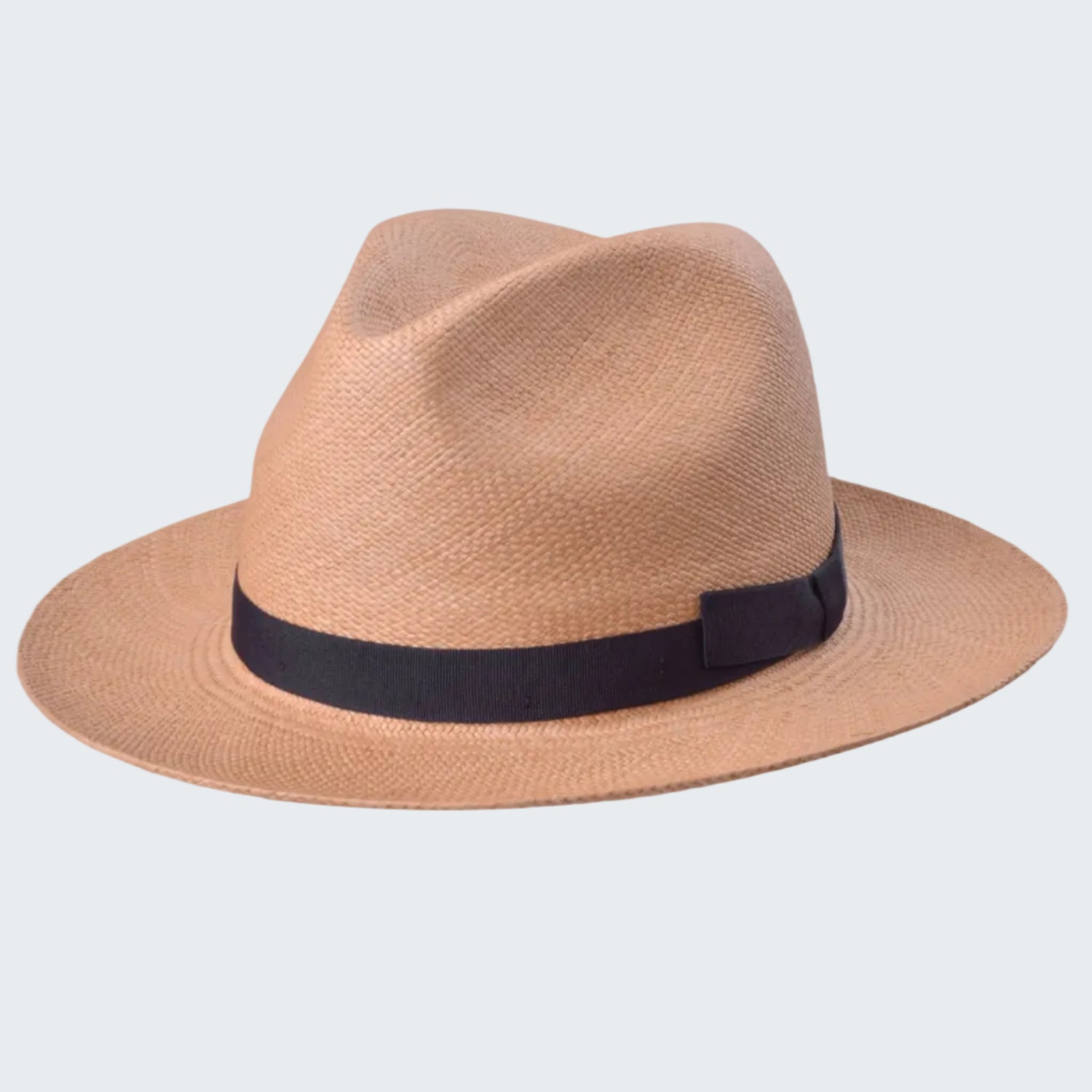 Beige straw hat with a black band on a white background