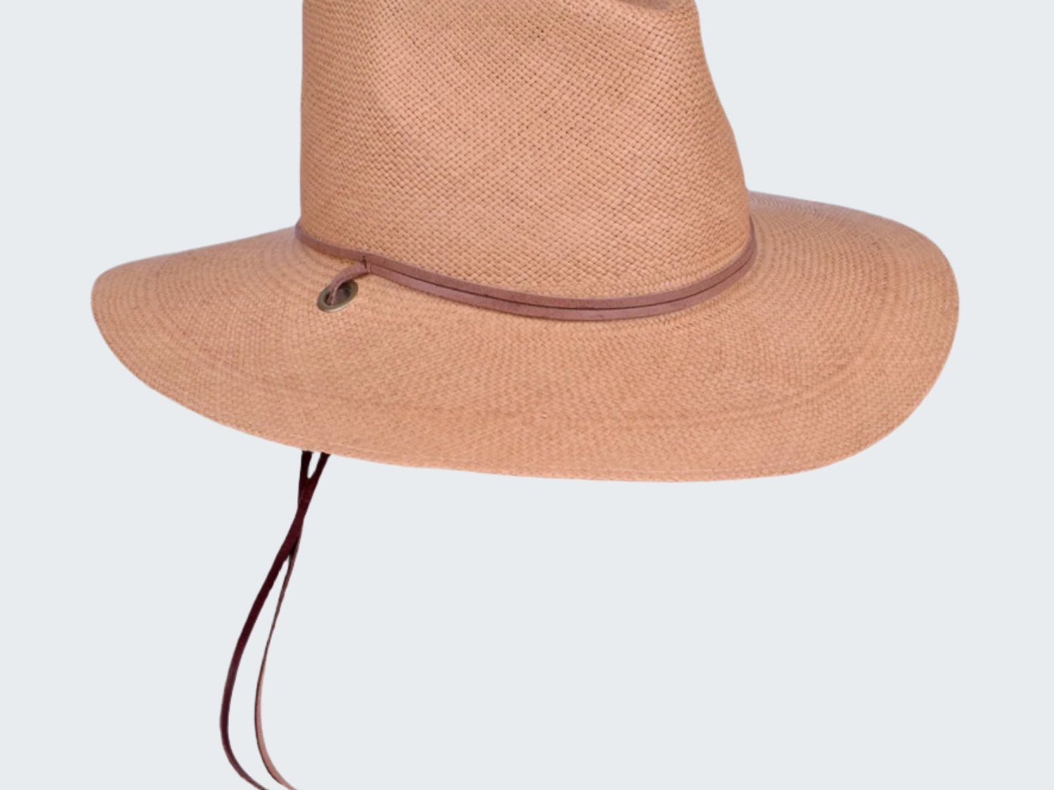 Beige wide-brimmed hat with a brown band on a white background