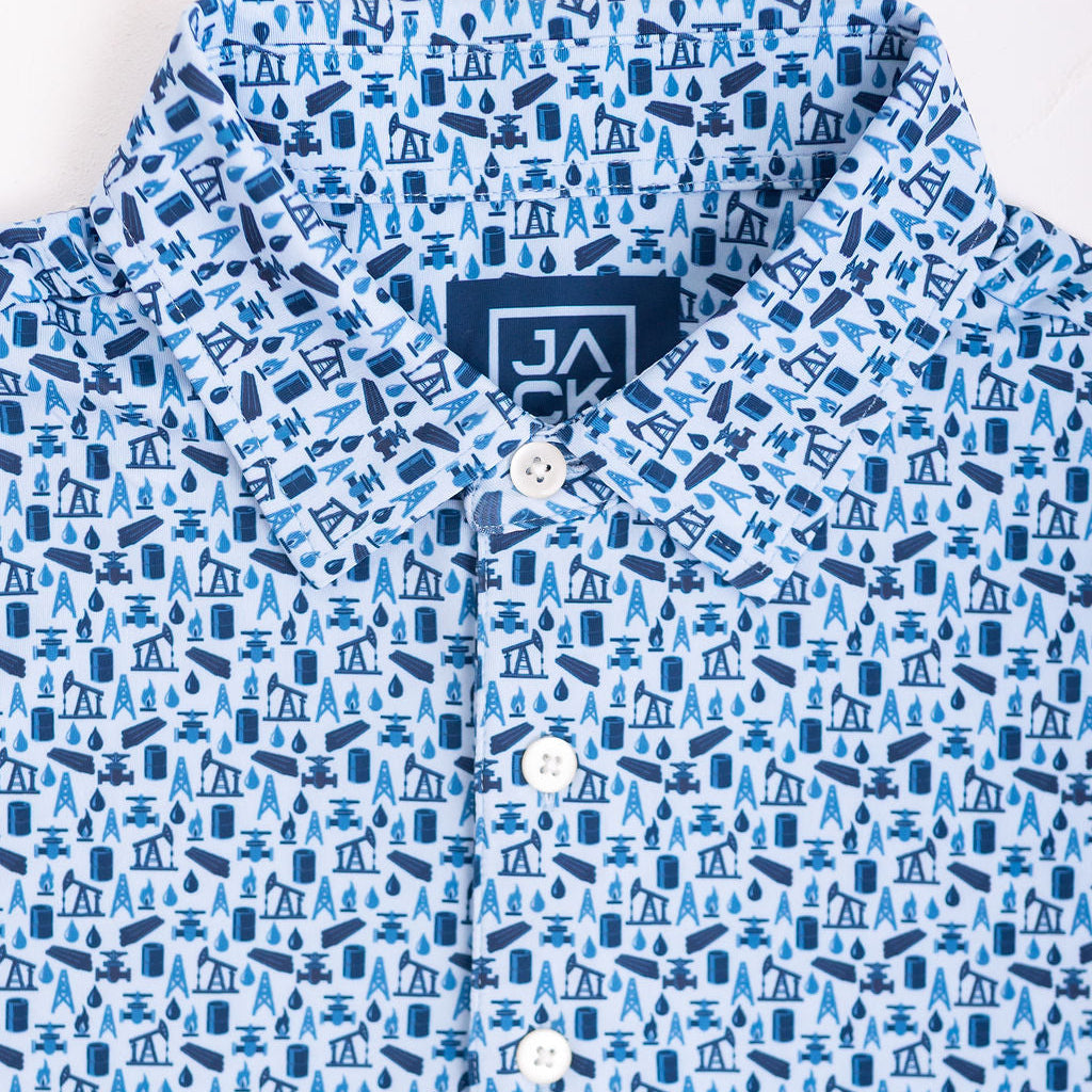 Blue patterned shirt with a brand label on a white background