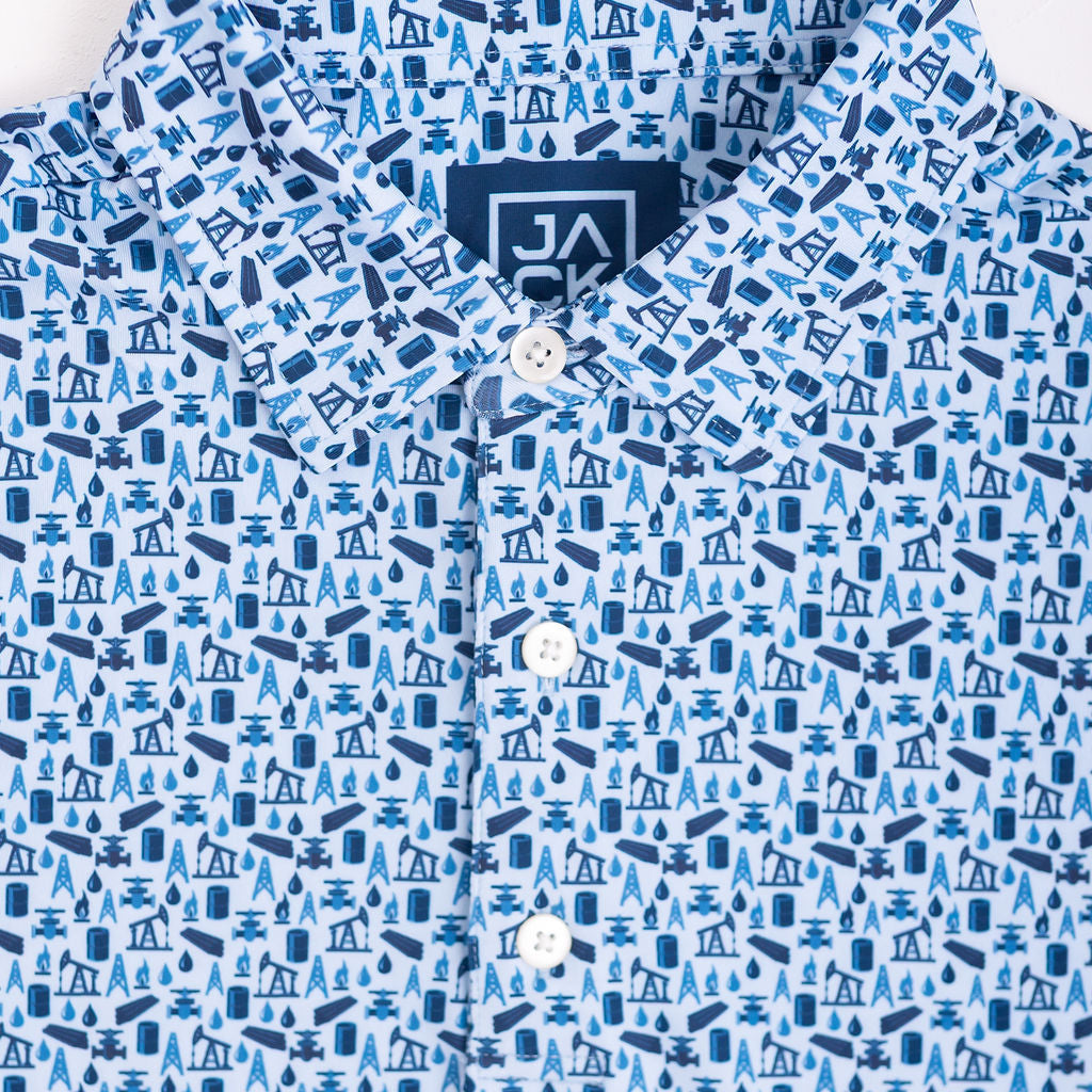 Blue patterned shirt with a brand label on a white background
