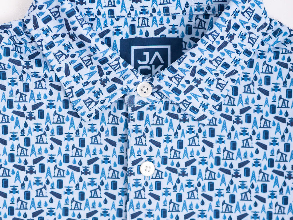 Blue patterned shirt with a brand label on a white background