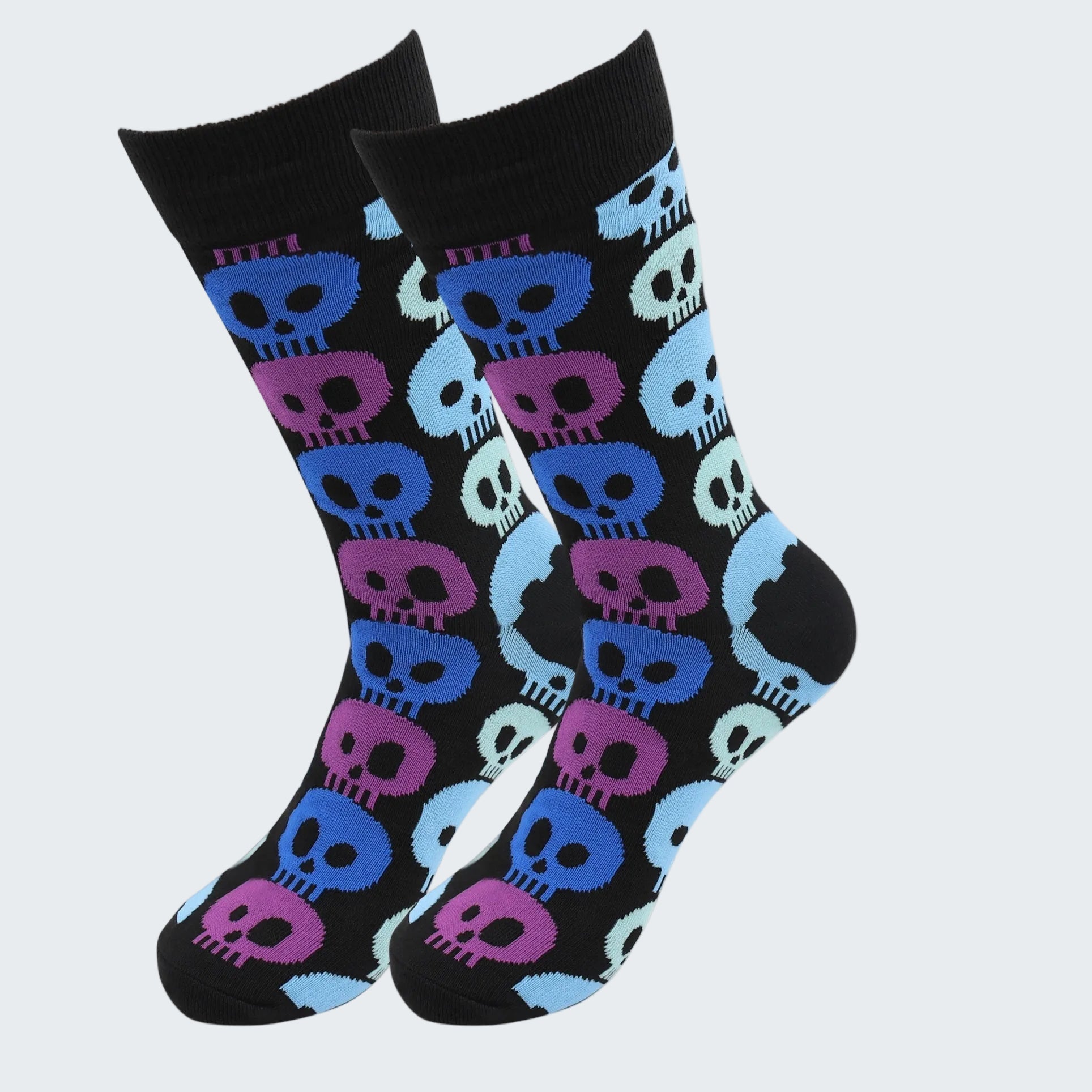 Black socks with colorful skull pattern on a white background