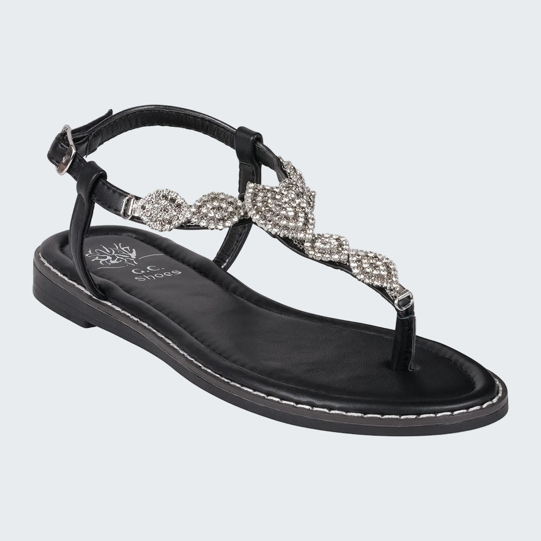 Black sandal with rhinestone embellishments on a white background