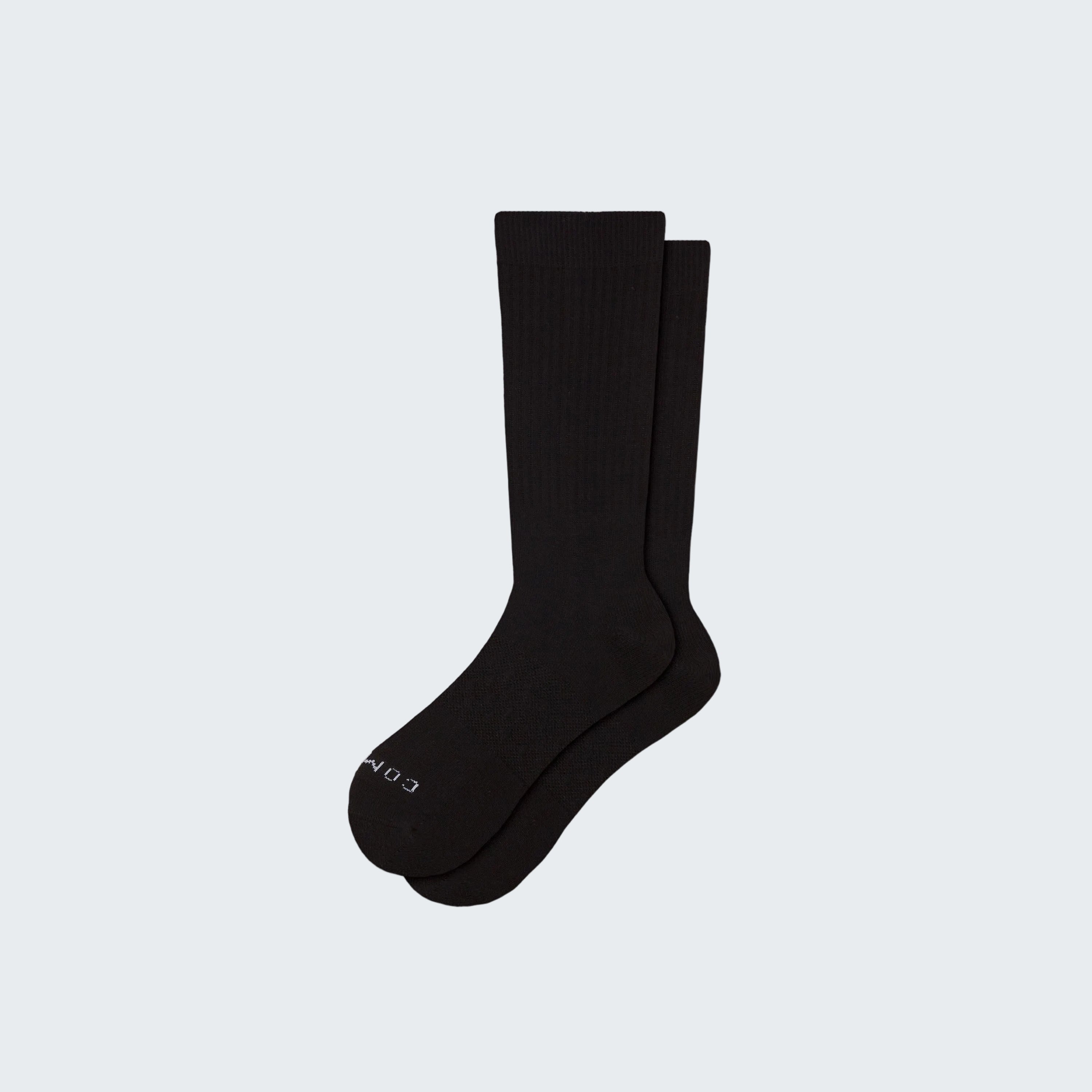 Pair of black socks on a white background