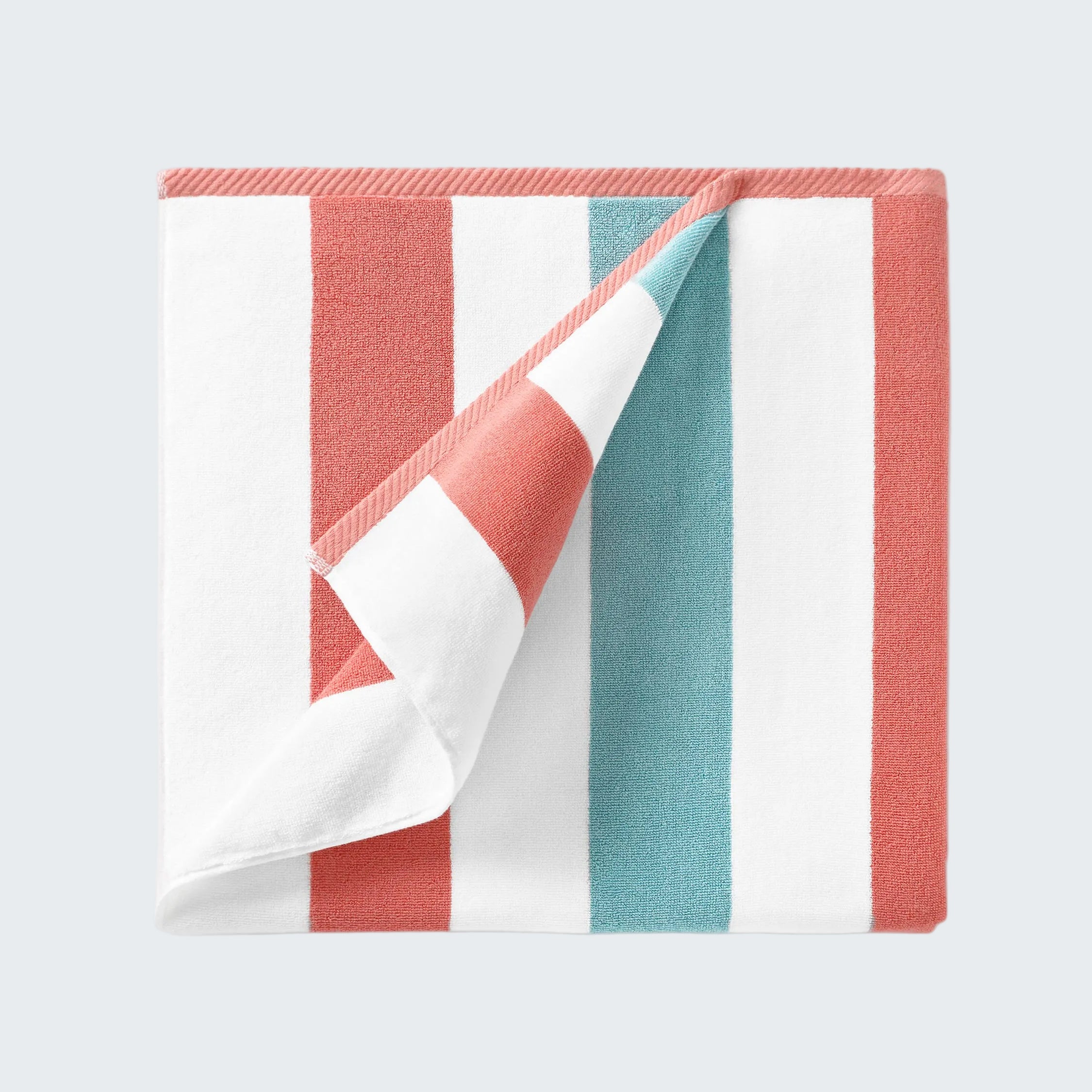 Folded fabric with red, white, and blue stripes on a white background