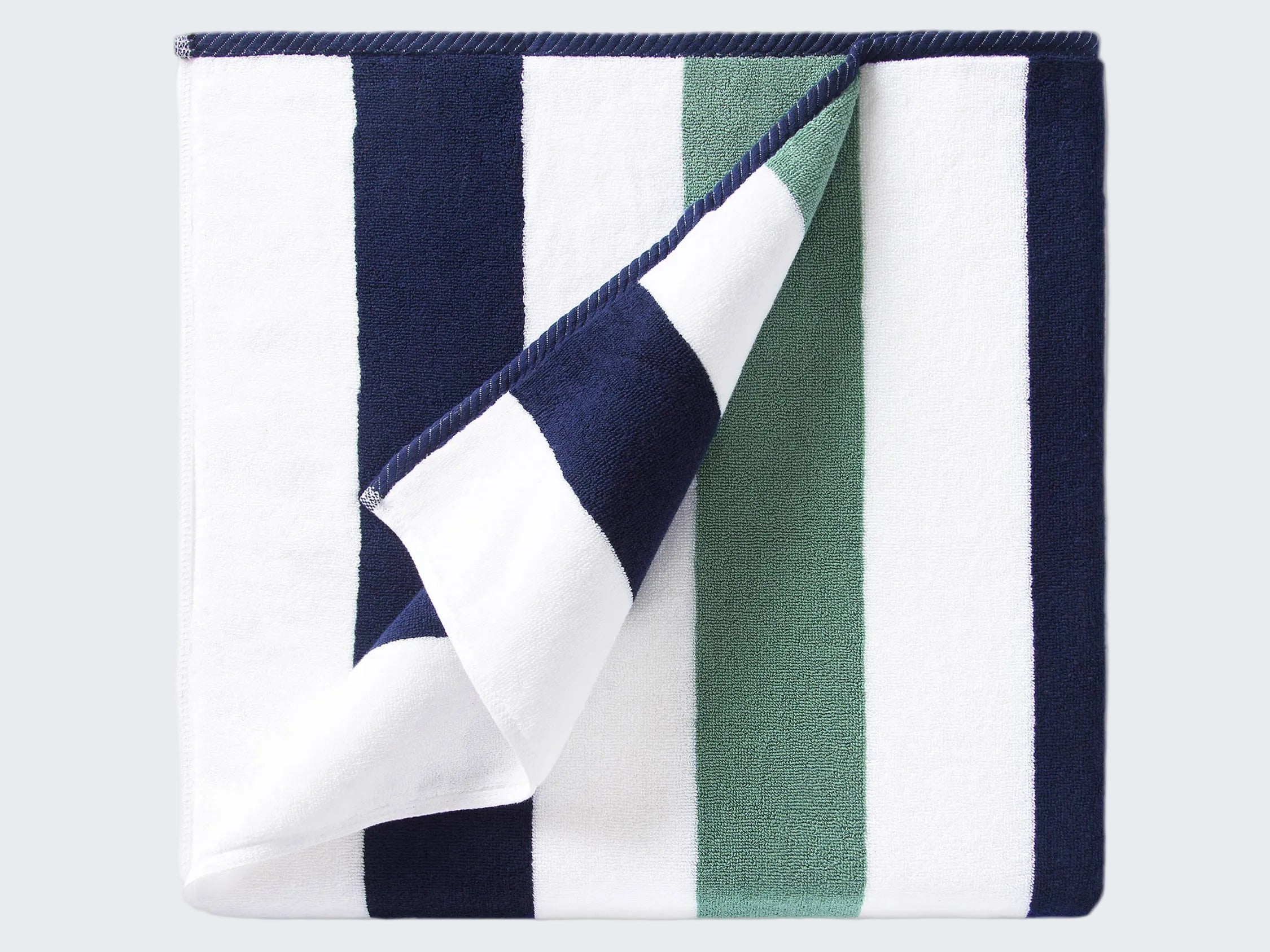 Striped fabric with blue, green, and white colors on a white background