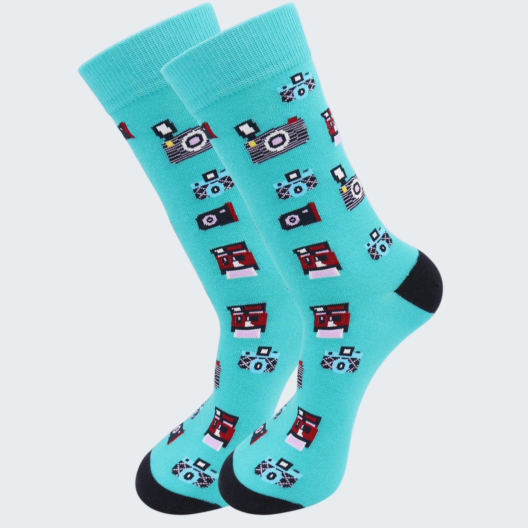 Turquoise socks with camera pattern on a white background