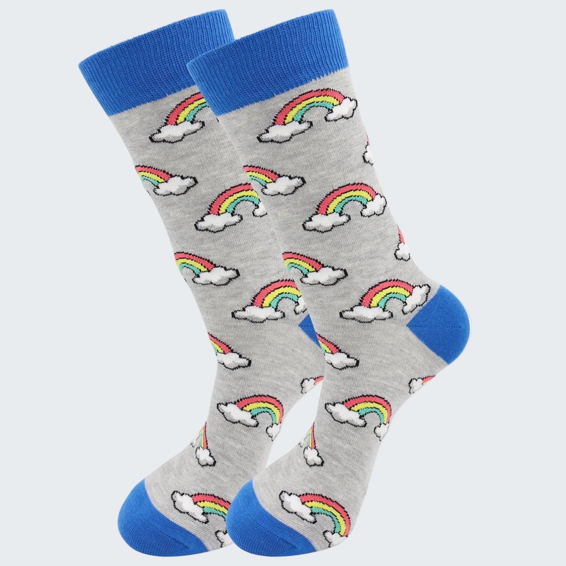 Gray socks with rainbow and cloud patterns and blue toes and cuffs on a white background