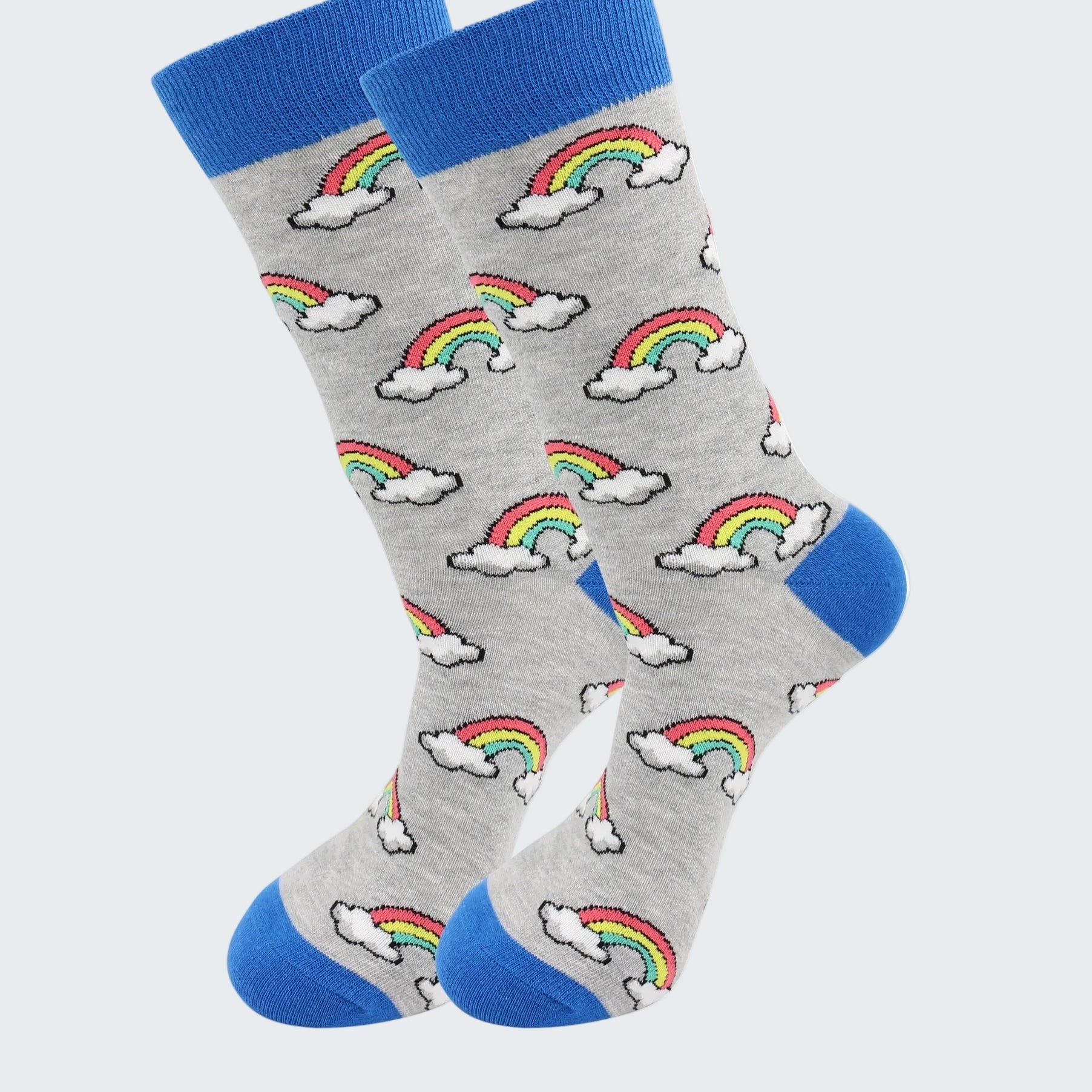 Gray socks with rainbow and cloud patterns and blue toes and cuffs on a white background