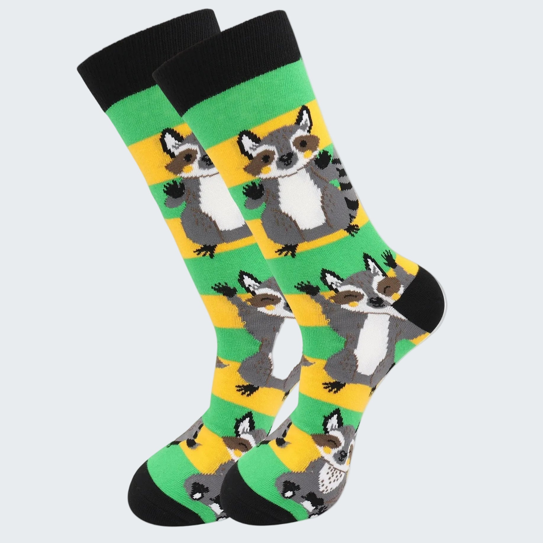 Colorful socks with raccoon pattern on a white background