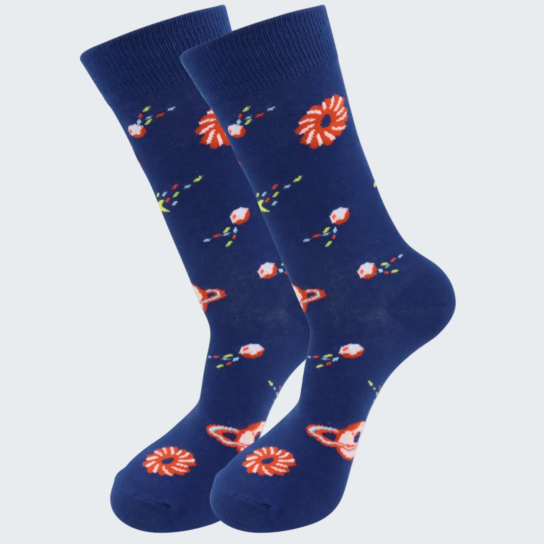 Pair of blue socks with red and white floral patterns on a white background