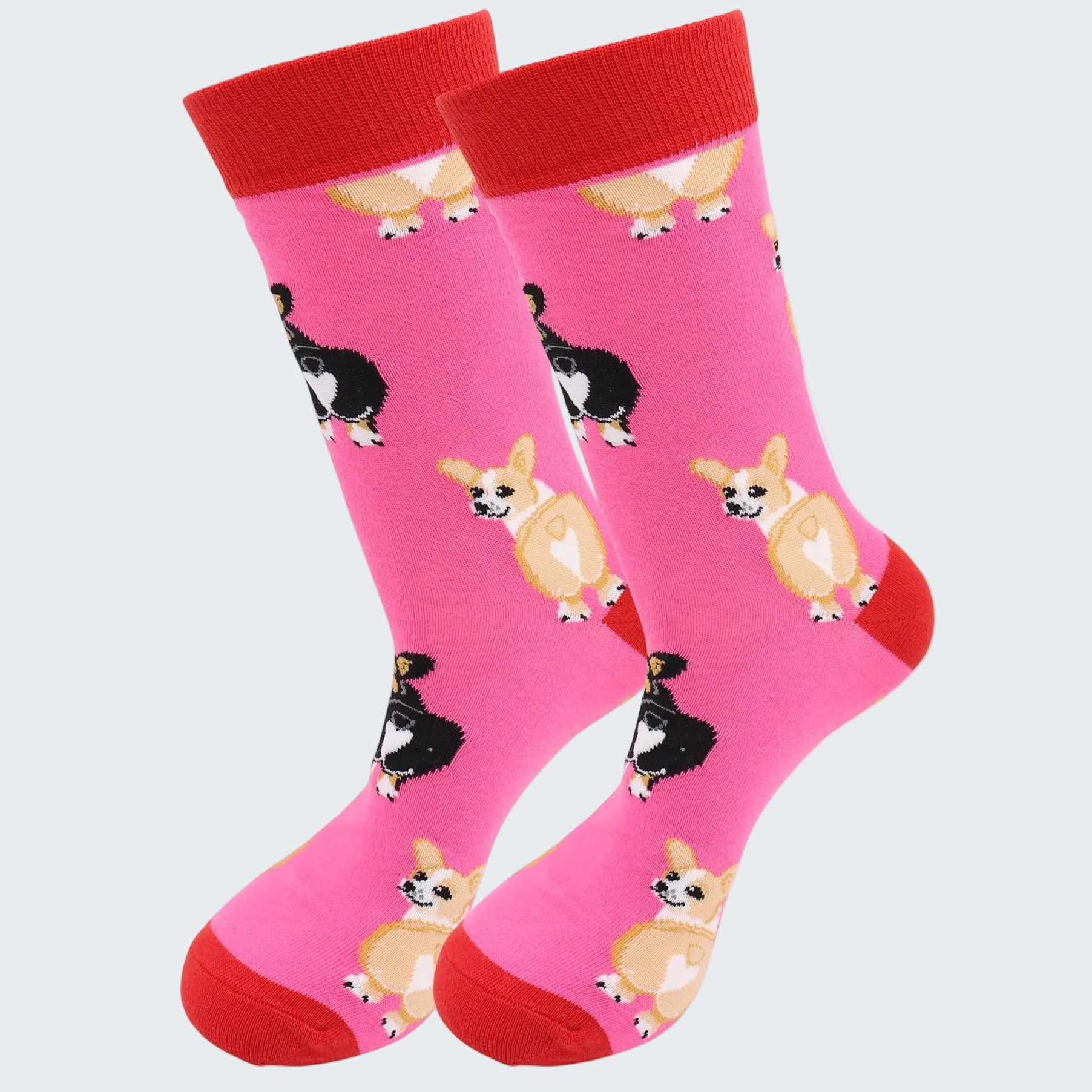 Pink socks with dog patterns on a white background