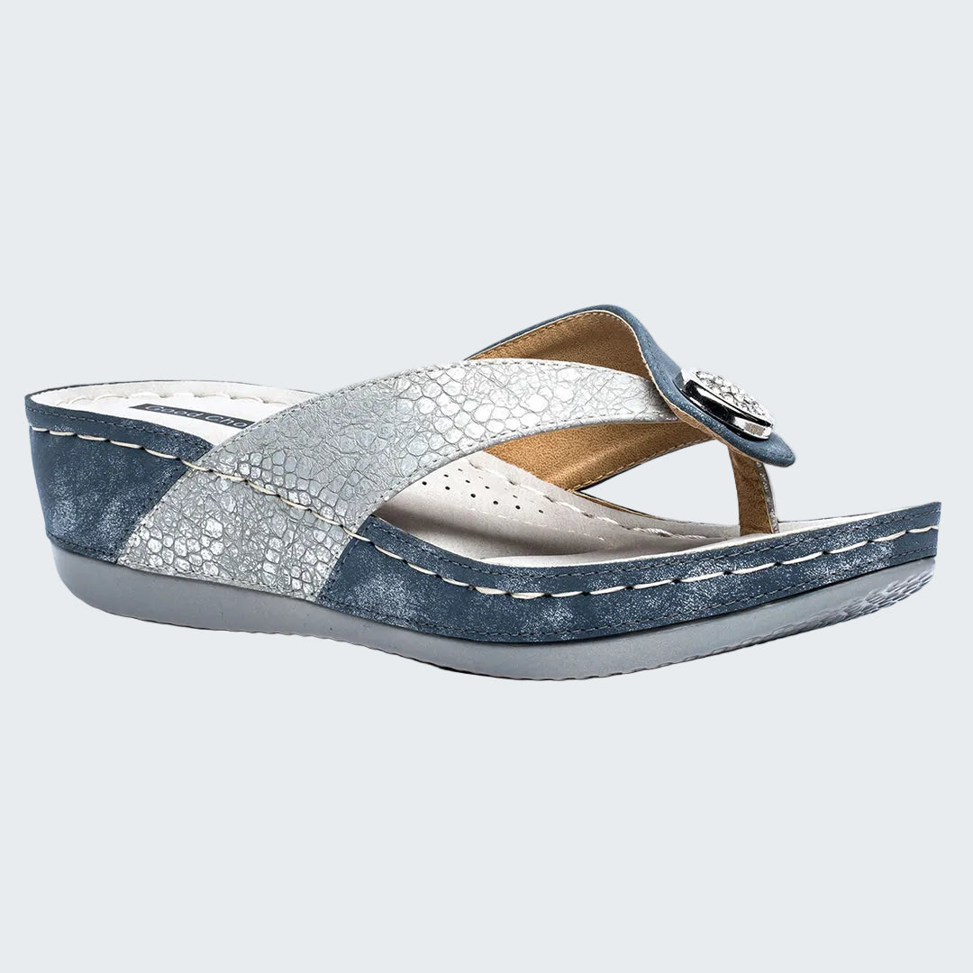 Blue and white sandal with a strap on a white background