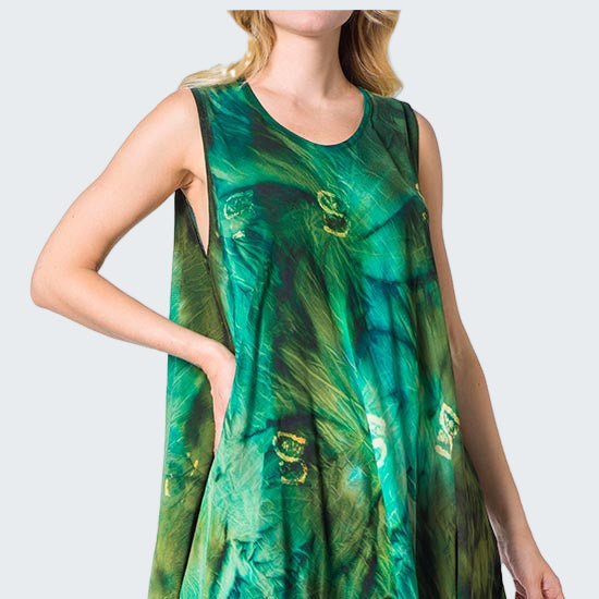 Green floral dress worn by a model on a white background
