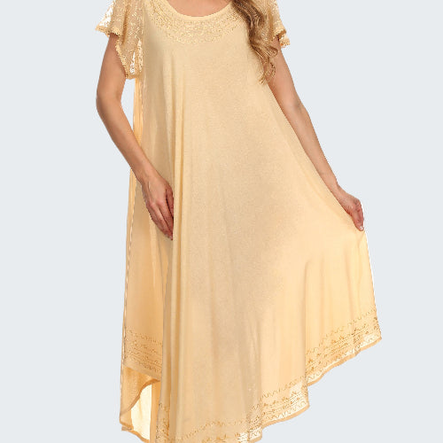 Woman wearing a light yellow dress with lace sleeves on a white background