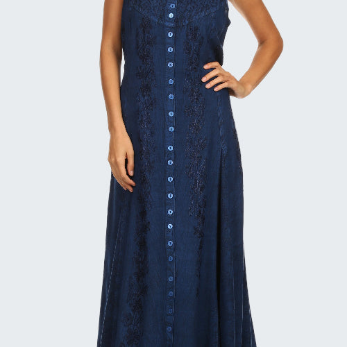Woman wearing a navy blue sleeveless dress with buttons on a white background