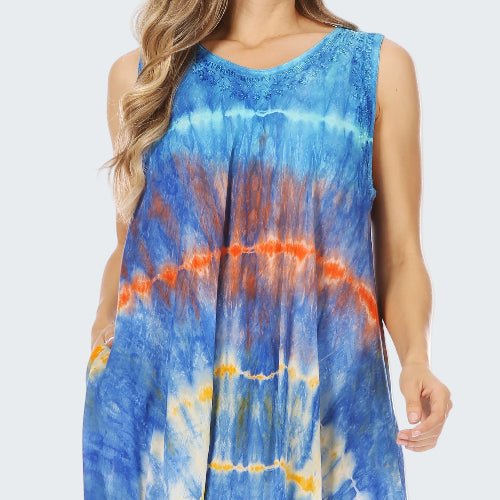 Blue tie-dye dress with orange and yellow accents on a white background