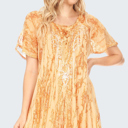 Woman wearing an orange tie-dye dress on a white background