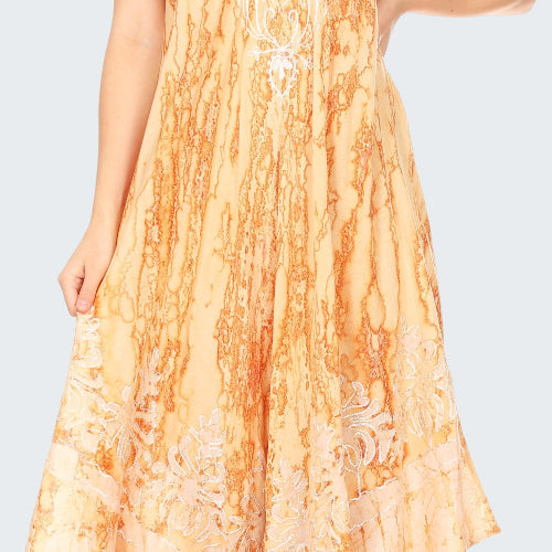 Woman wearing an orange tie-dye dress on a white background